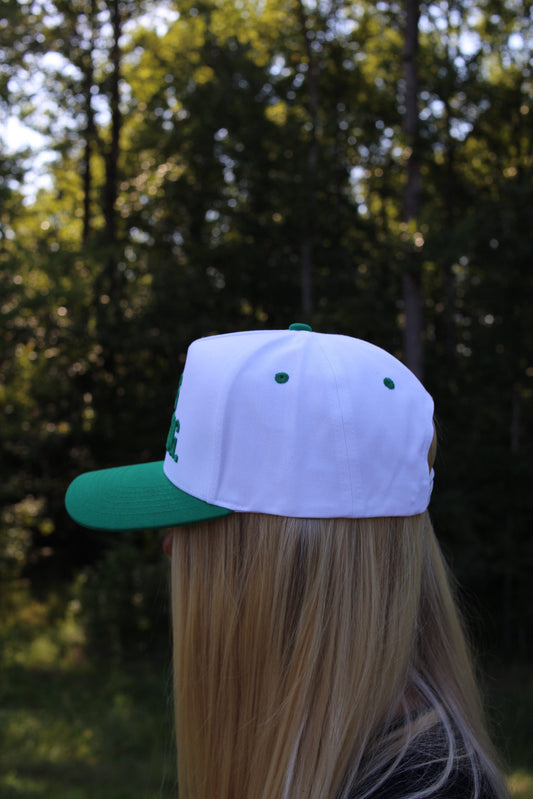 "He's Golfing" Embroidered Two Tone Hat - Green