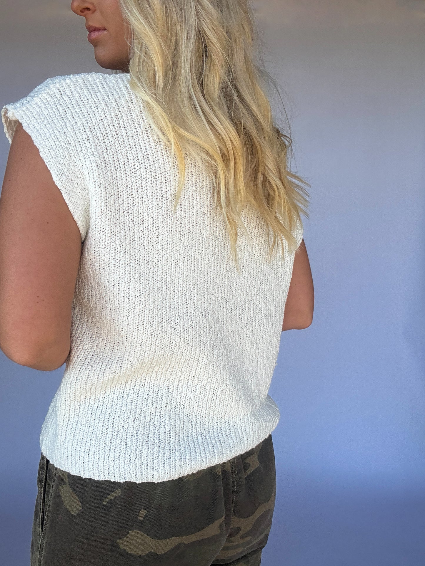Off White Sleeveless Sweater Top